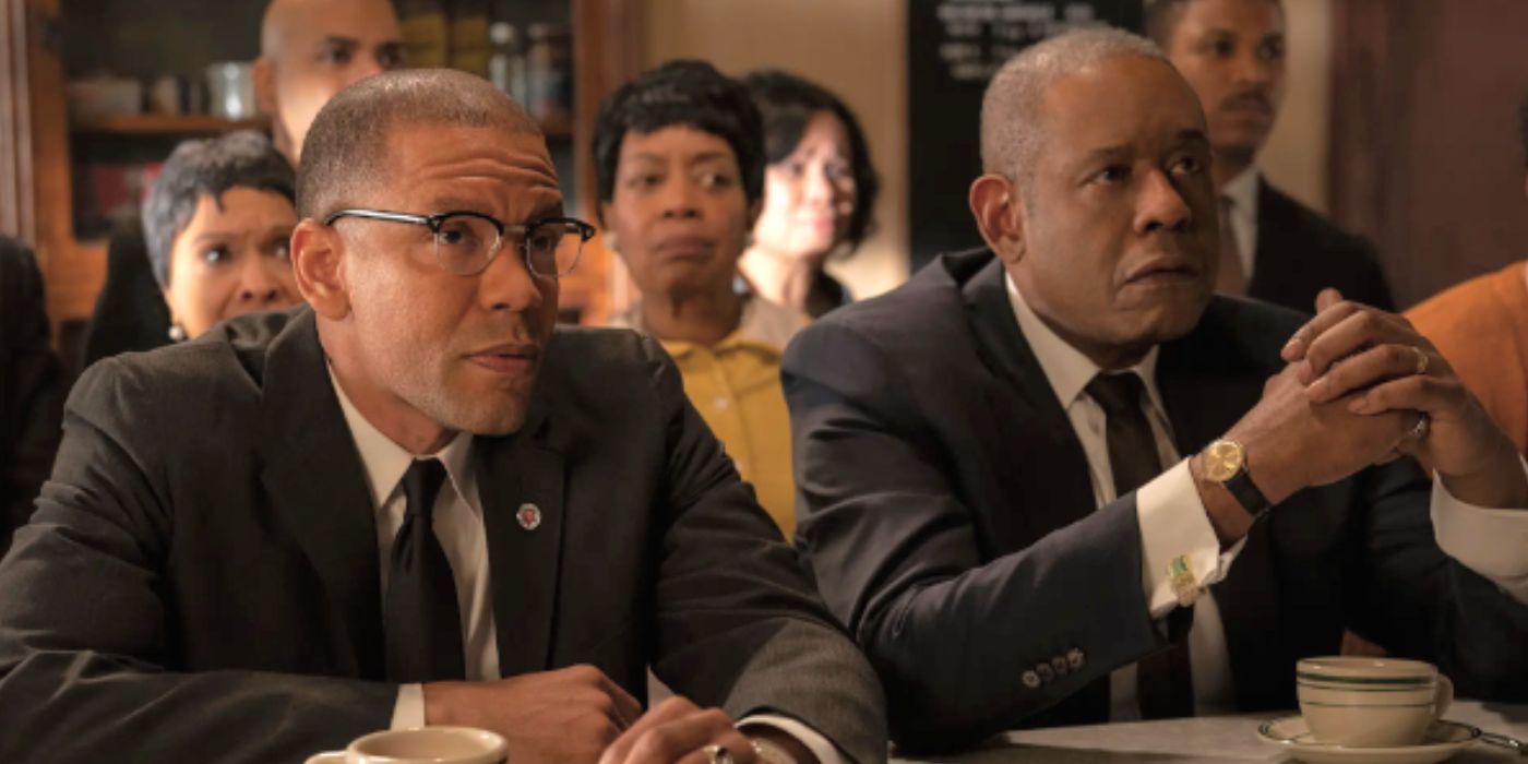 Nigel Thatch and Forest Whitaker sitting at a counter in a diner in Godfather of Harlem