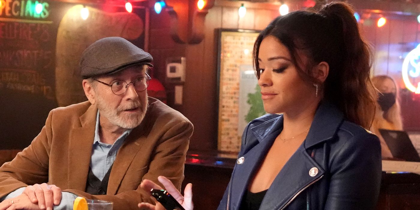 Martin Mull and Gina Rodriguez at a bar in Not Dead Yet