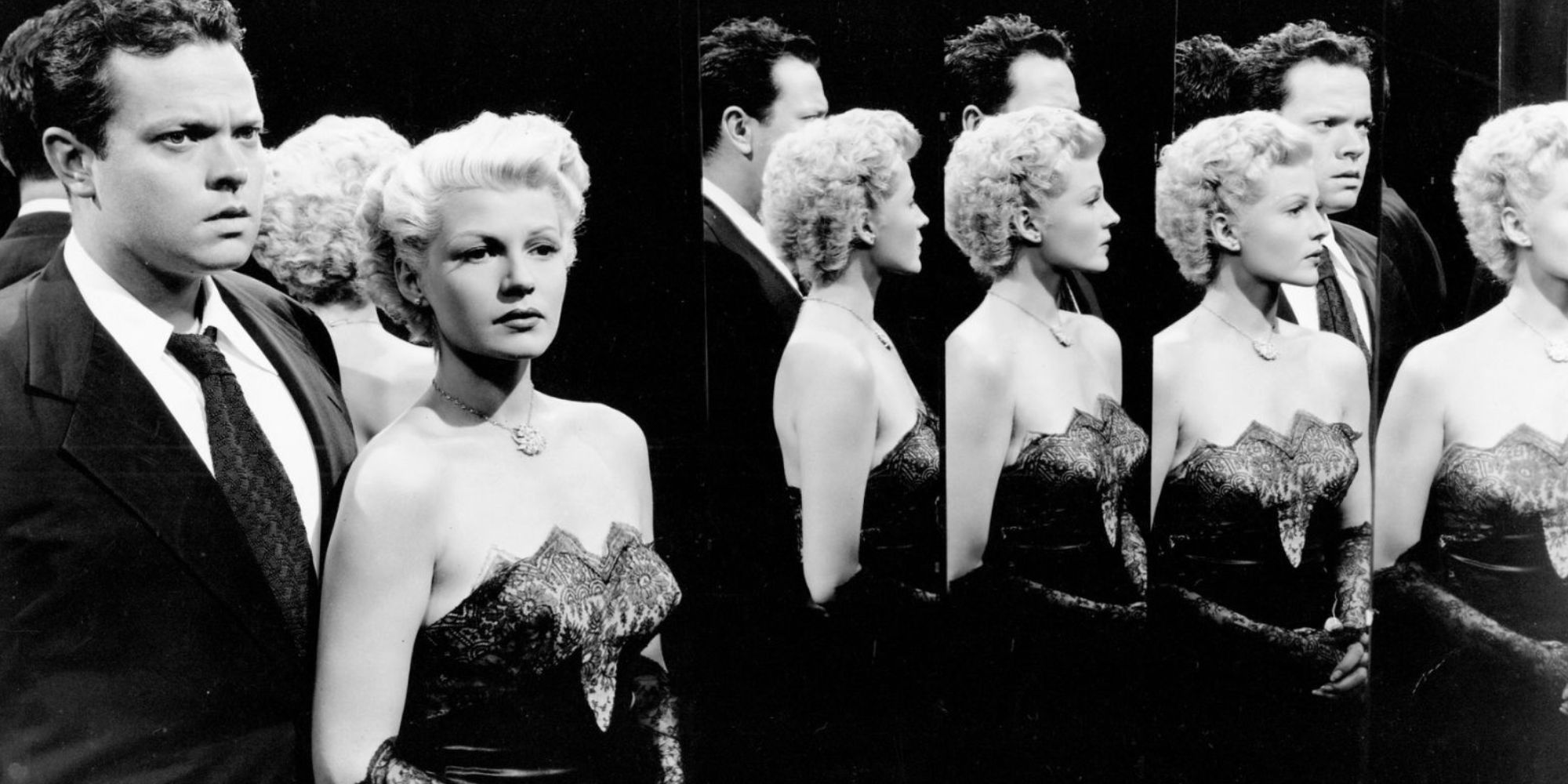 Orson Welles and Rita Hayworth standing together in The Lady from Shanghai