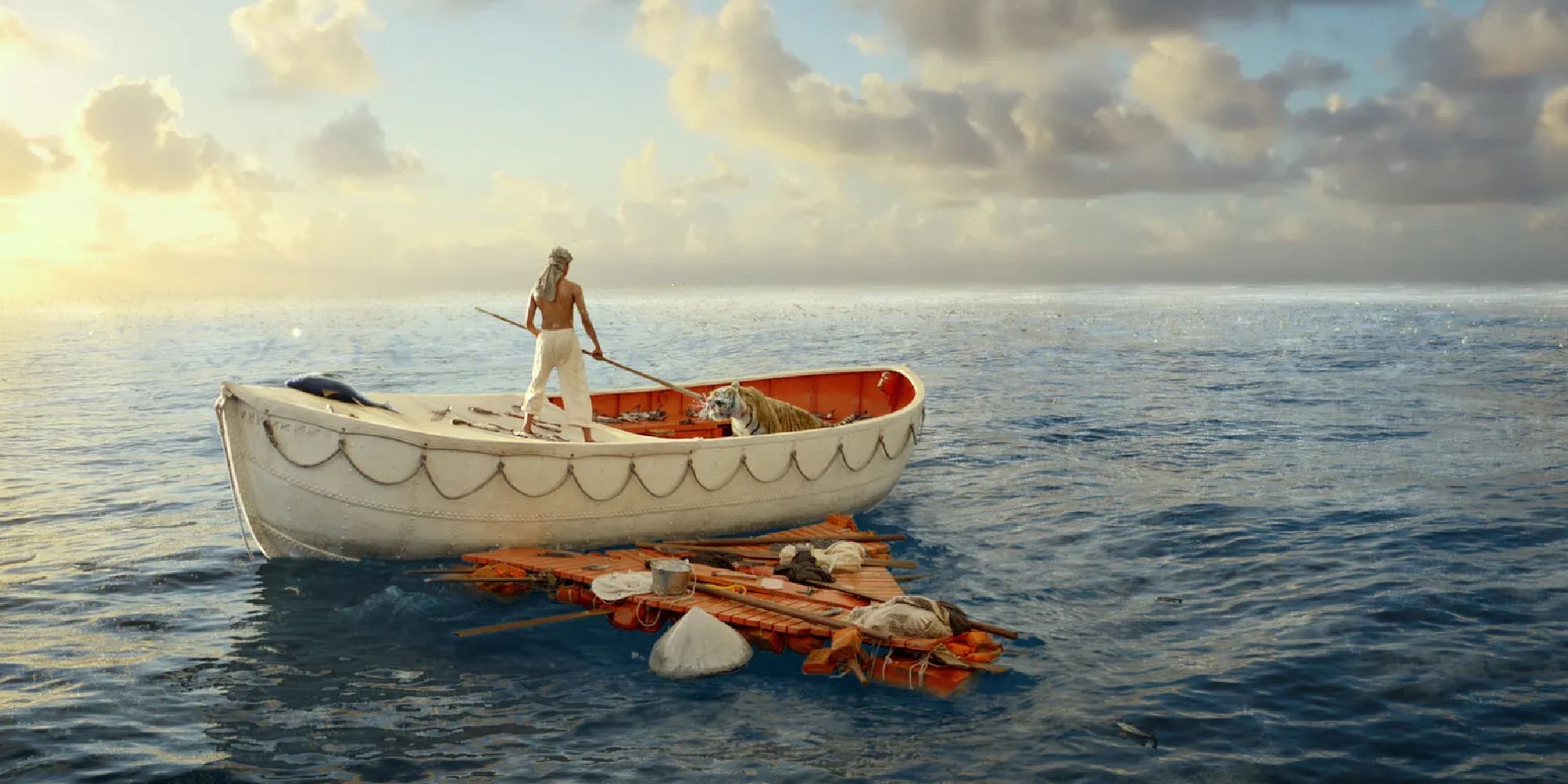 Pi and Richard Parker inside of a small boat in Life of Pi