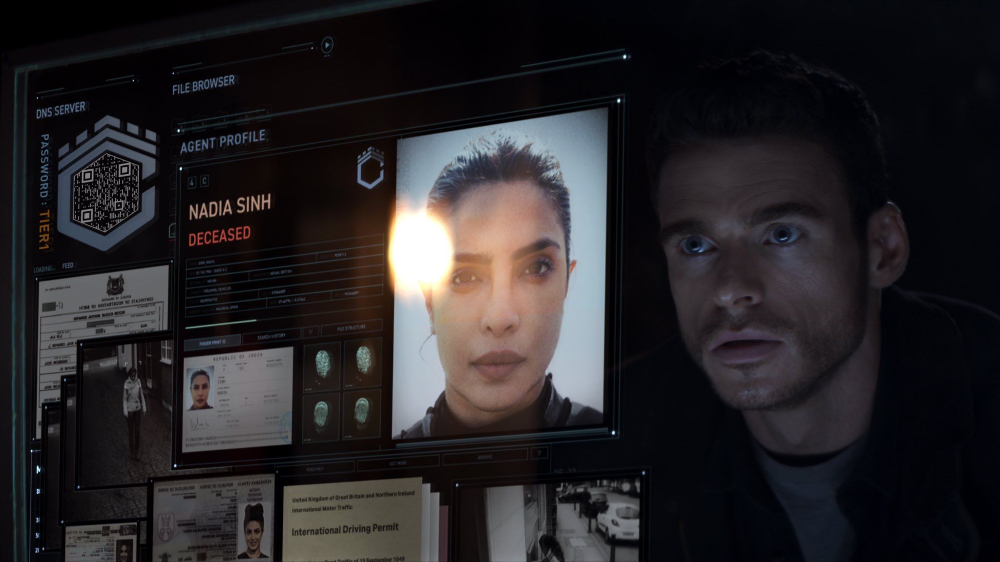 Richard Madden looking at a screen with Priyanka Chopra's face on it in Citadel