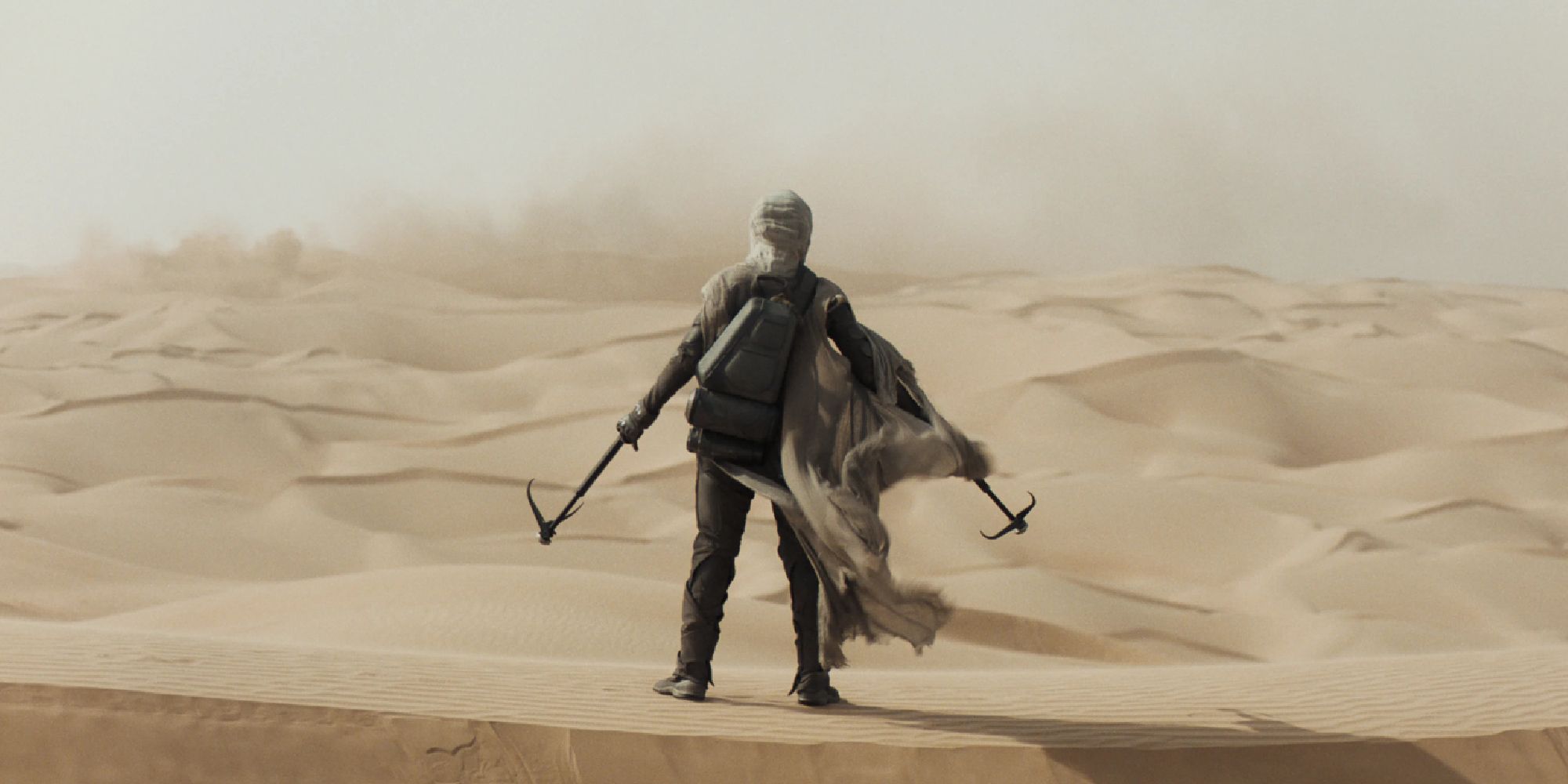 Someone in the middle of the desert in Dune