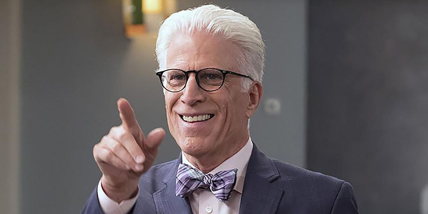 Michael smiling and pointing at someone in The Good Place.