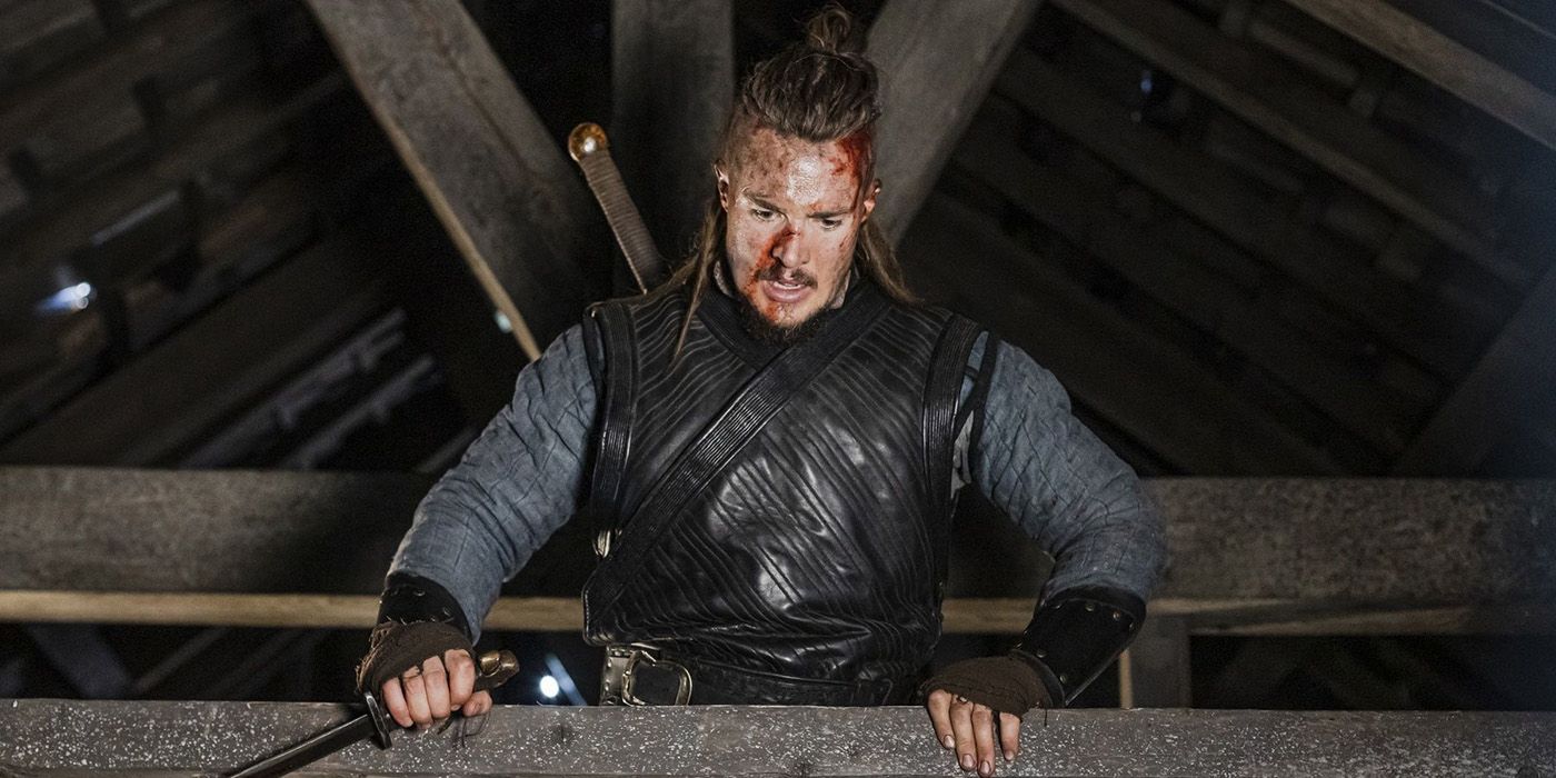Alexander Dreymon covered in blood and standing in the rafters in The Last Kingdom