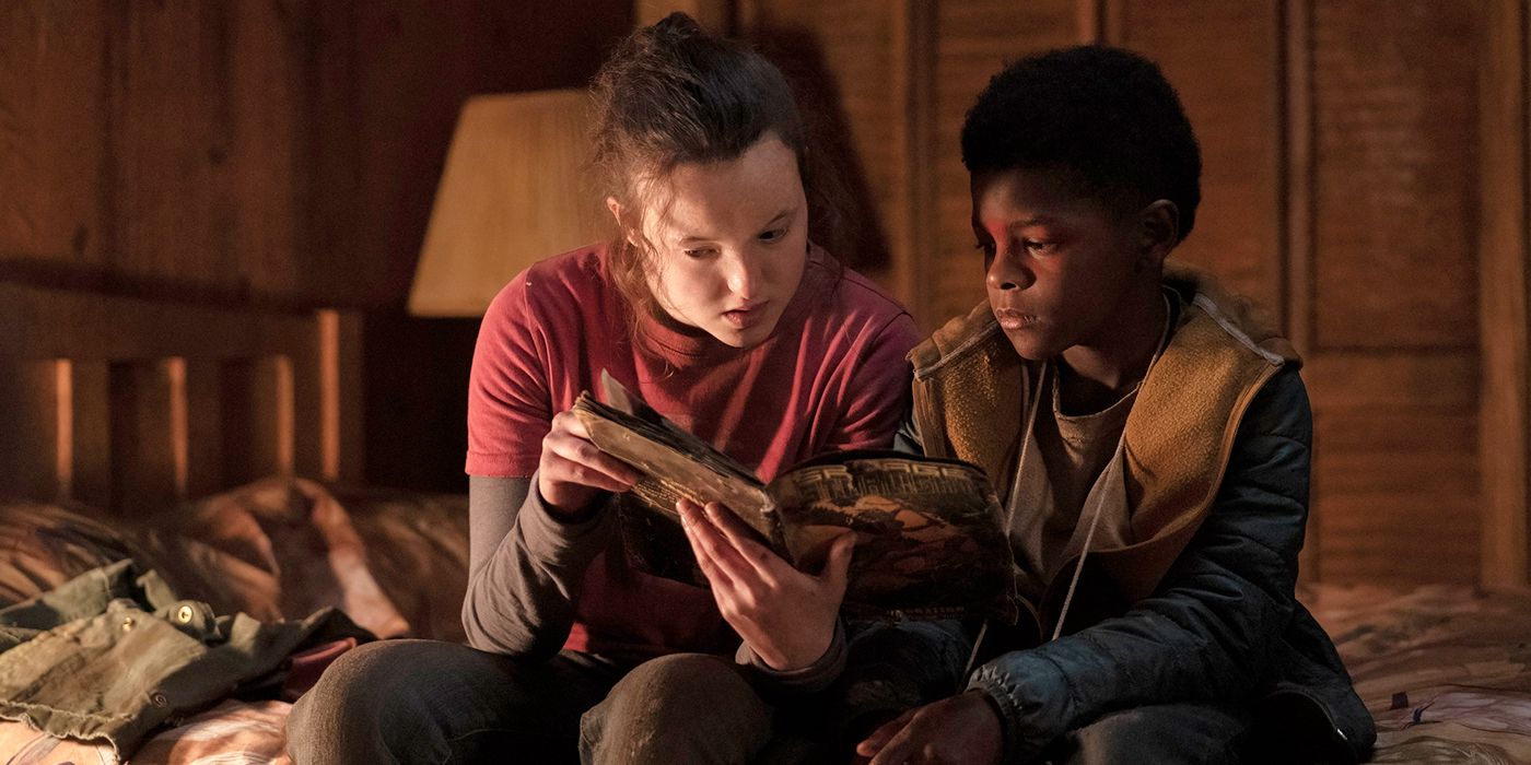 Bella Ramsey as Elllie and Keivonn Woodard as Sam in The Last of Us Episode 5 sitting on a bed together.