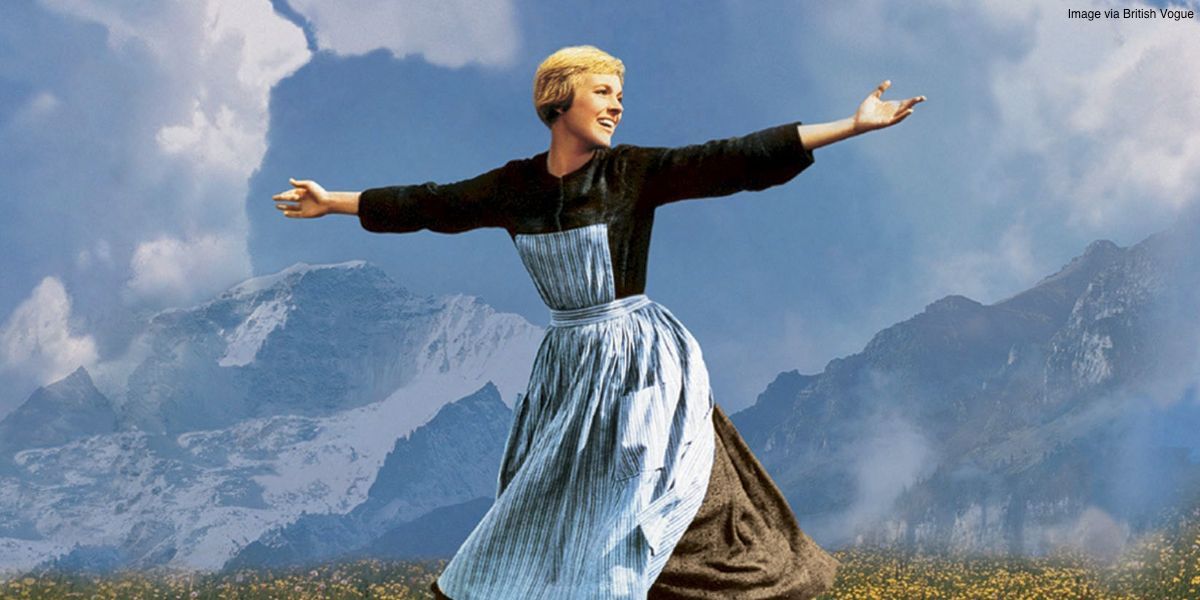 Julie Andrews as Maria singing in the moutains in The Sound of Music