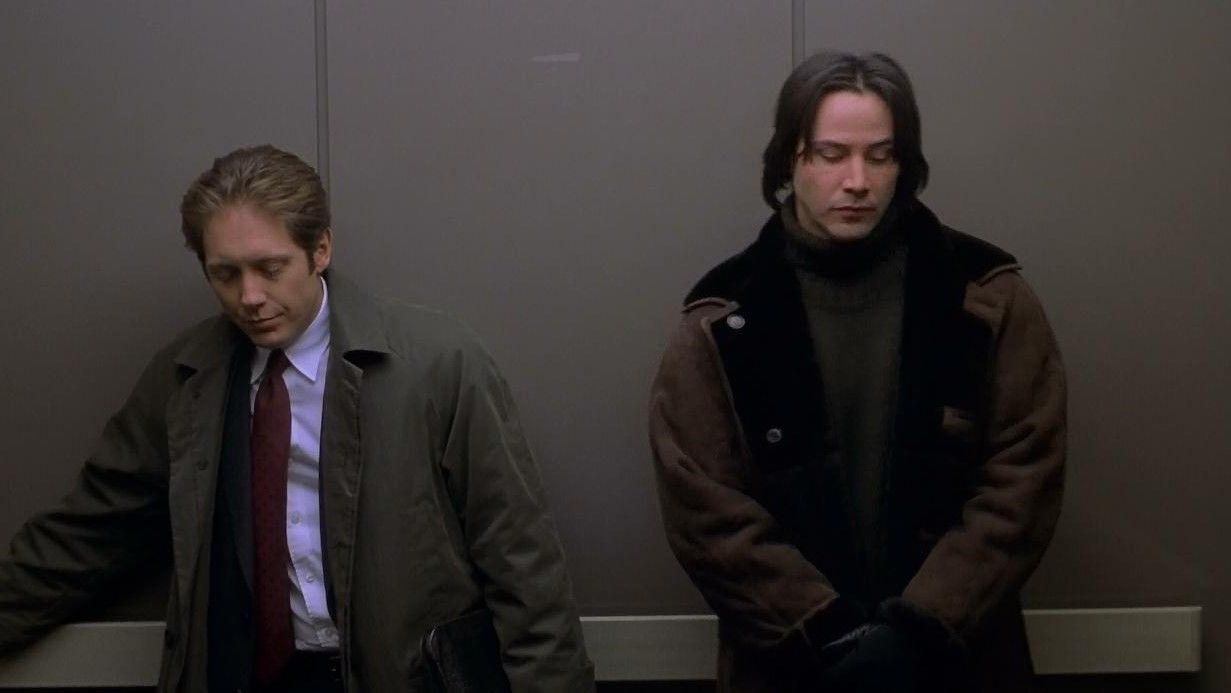James Spader and Keanu Reeves in The Watcher. 