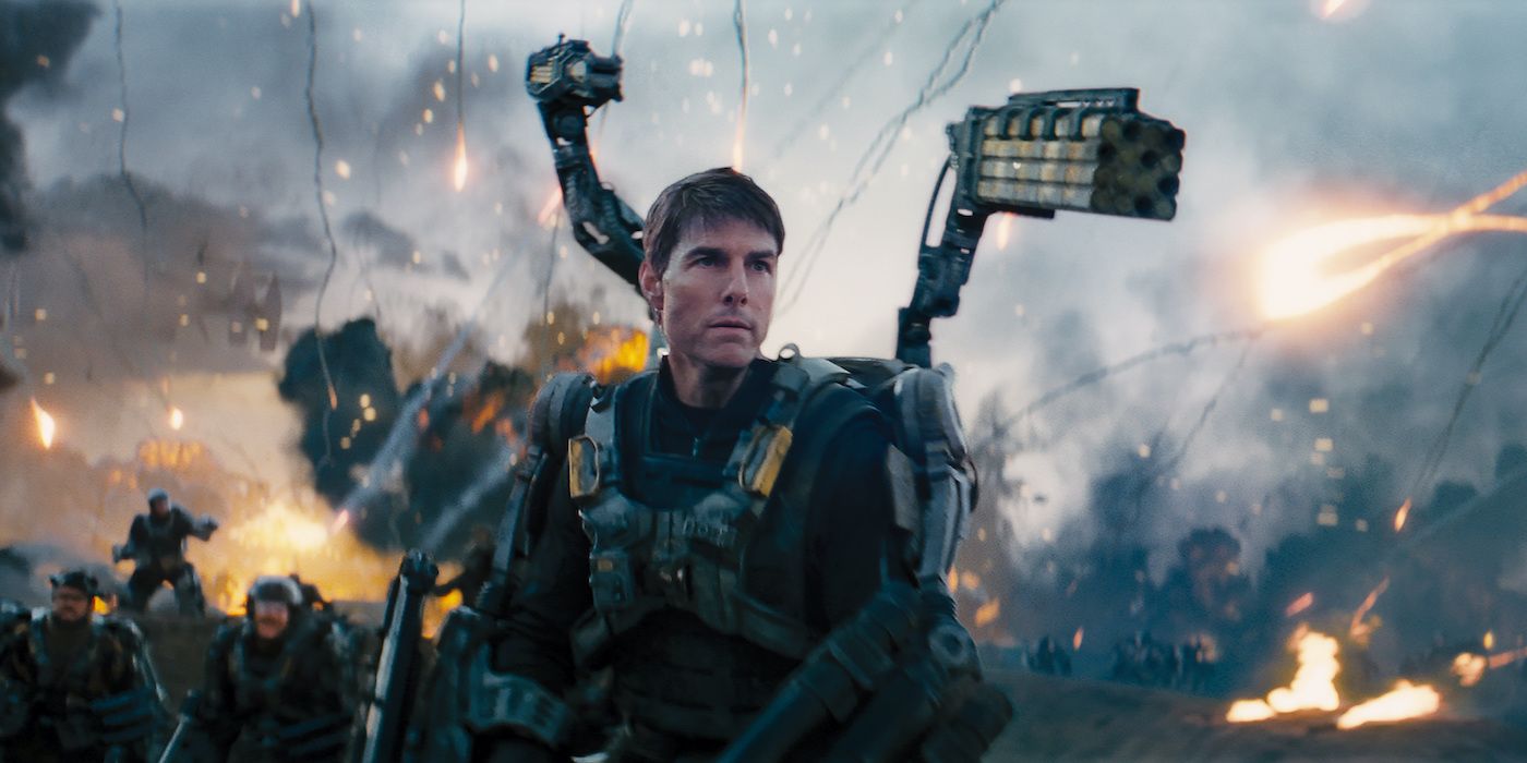 Major William Cage, wearing his mecha-suit in battle with a gun pointed from his shoulder in Edge of Tomorrow