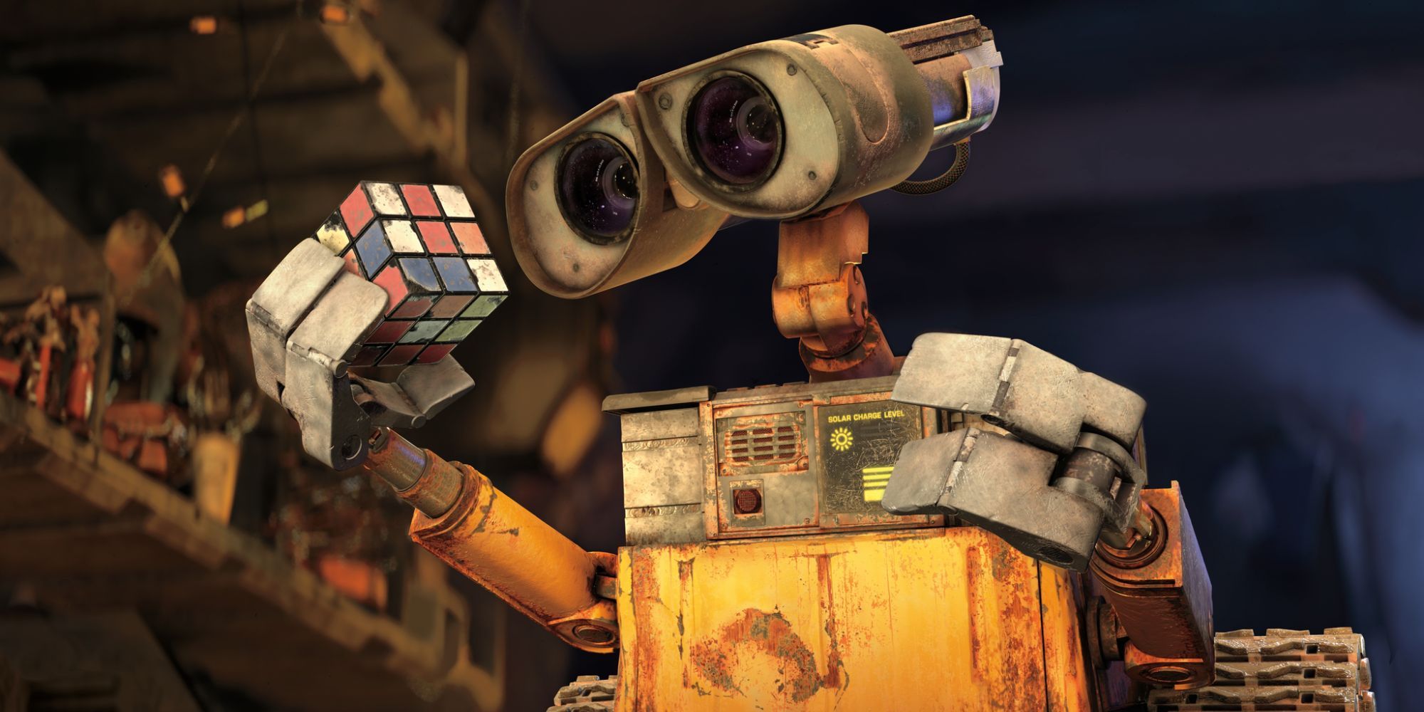 WALL-E holding a rubik's cube