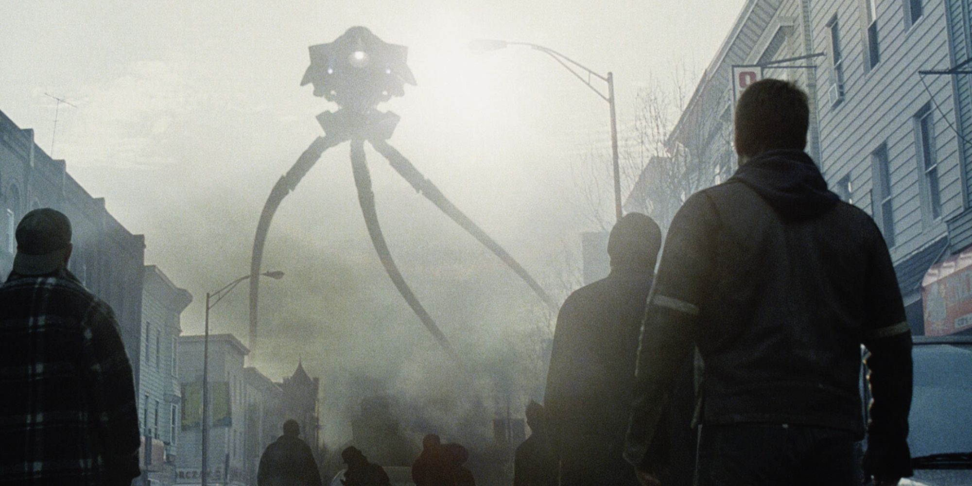 A huge tripod alien roams the streets of New Jersey as onlookers stare in horror in 'War of the Worlds'