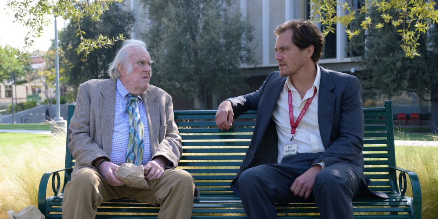 Michael Shannon and M. Emmet Walsh sitting on a bench in A Little White Lie