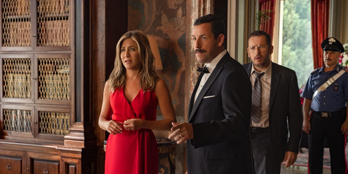 Jennifer Aniston and Adam Sandler in red dress and smart suit for Murder Mystery 