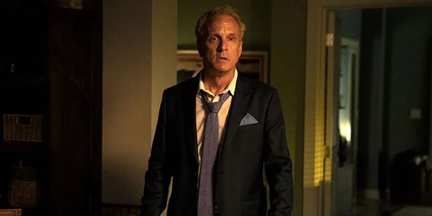 Howard from Better Call Saul looking disheveled and stunned, standing in Jimmy's home.