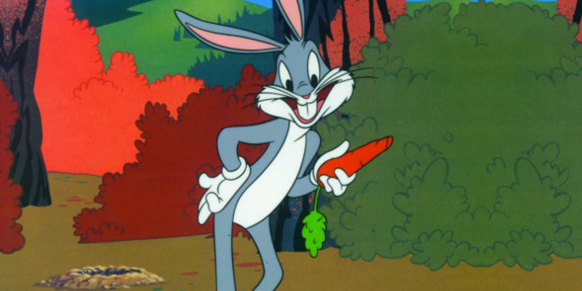 Bugs Bunny poses with a carrot