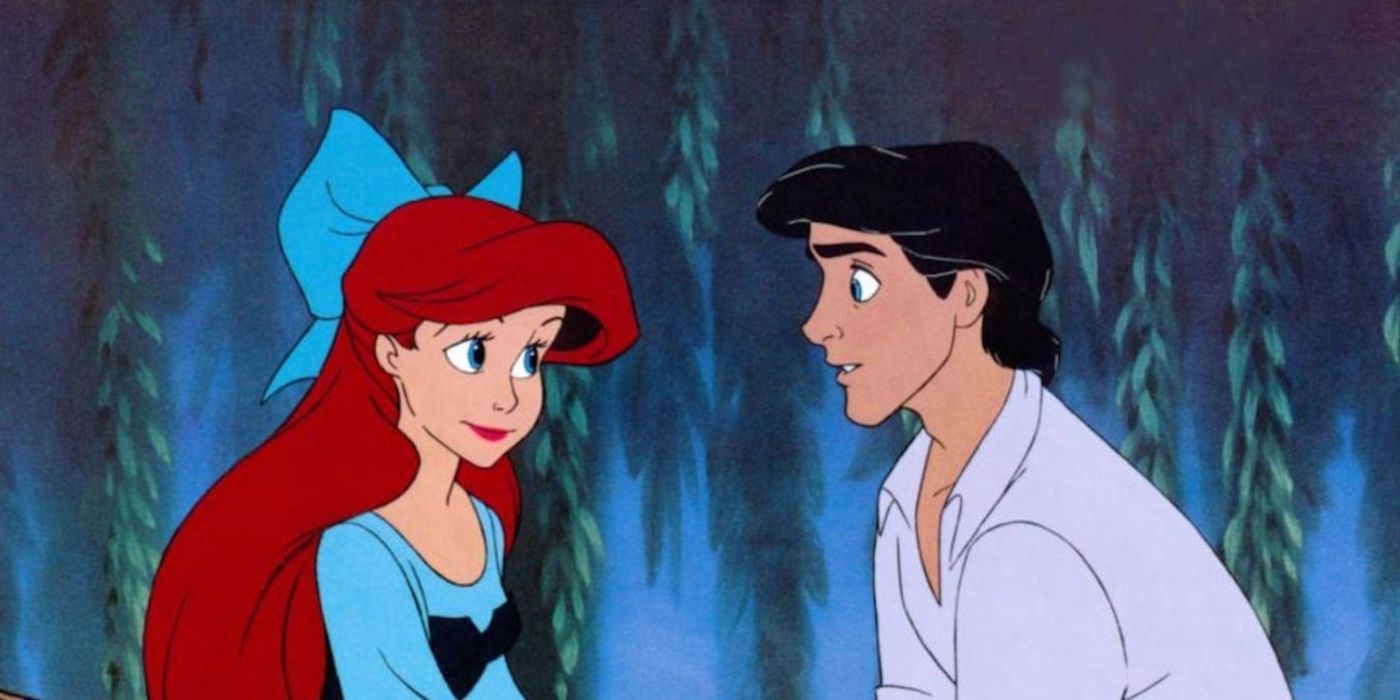 Ariel and Eric sitting in the boat and looking into each other's eyes during the Kiss the Girl scene in The Little Mermaid 1989
