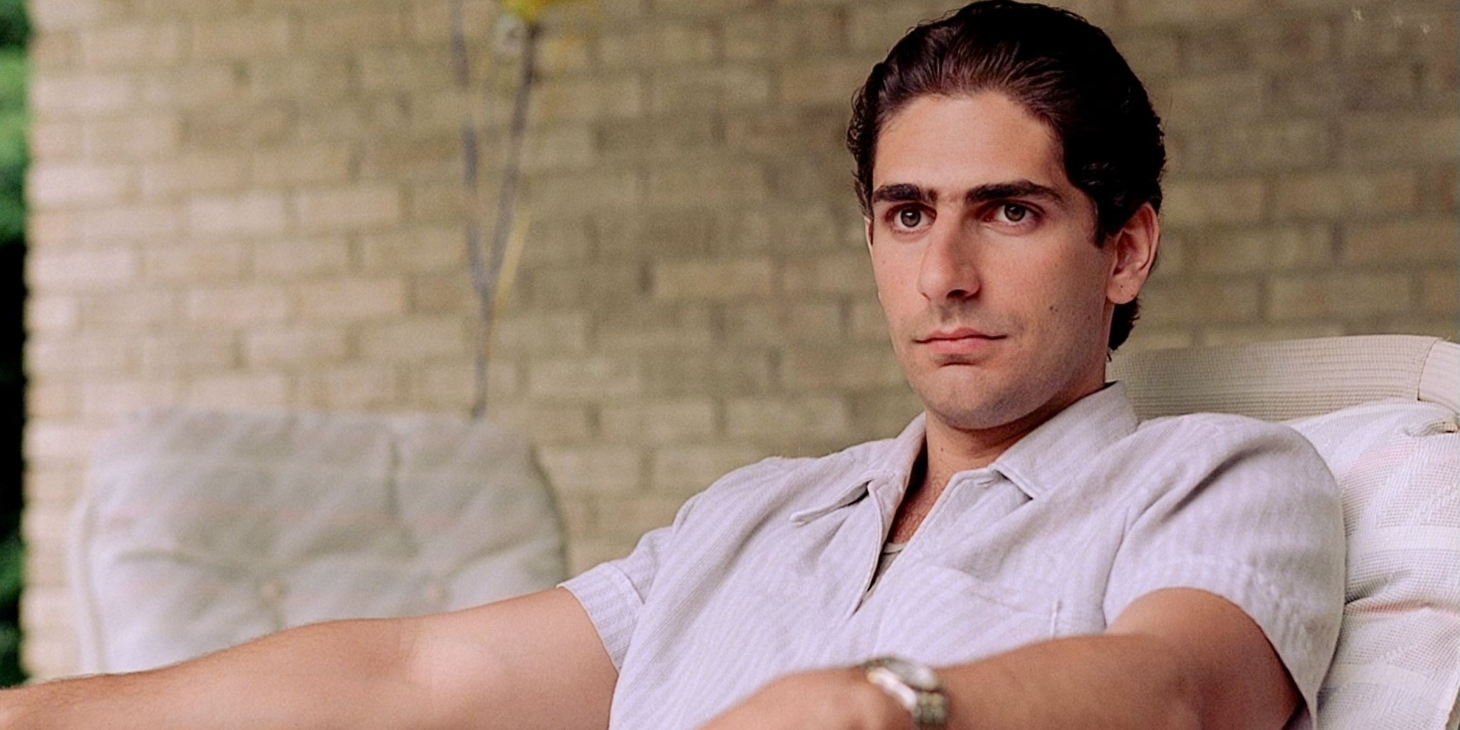 Michael Imperioli as Christopher Moltisanti sits on a chair and looks intently in “The Sopranos.”
