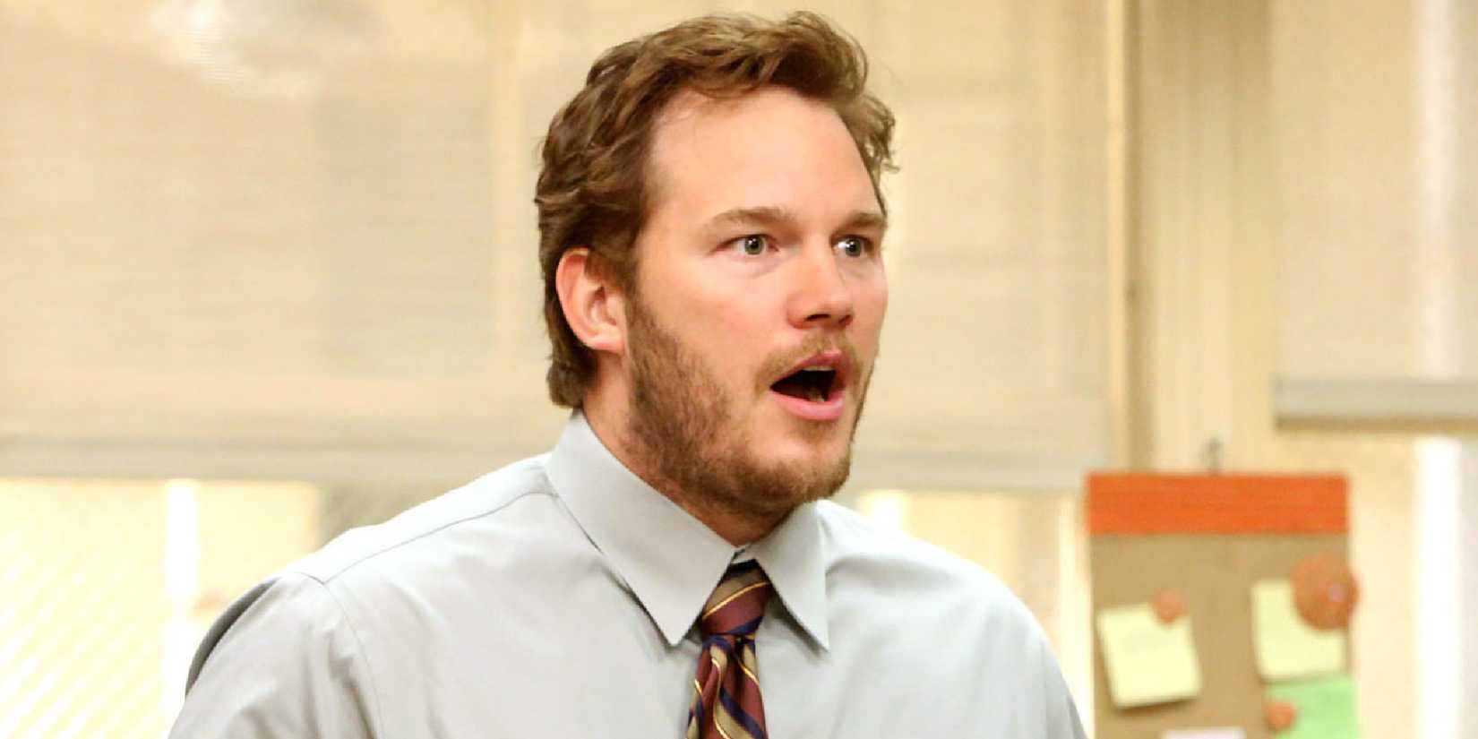 Chris Pratt as Andy Dwyer looking surprised with his mouth open in Parks and Recreation