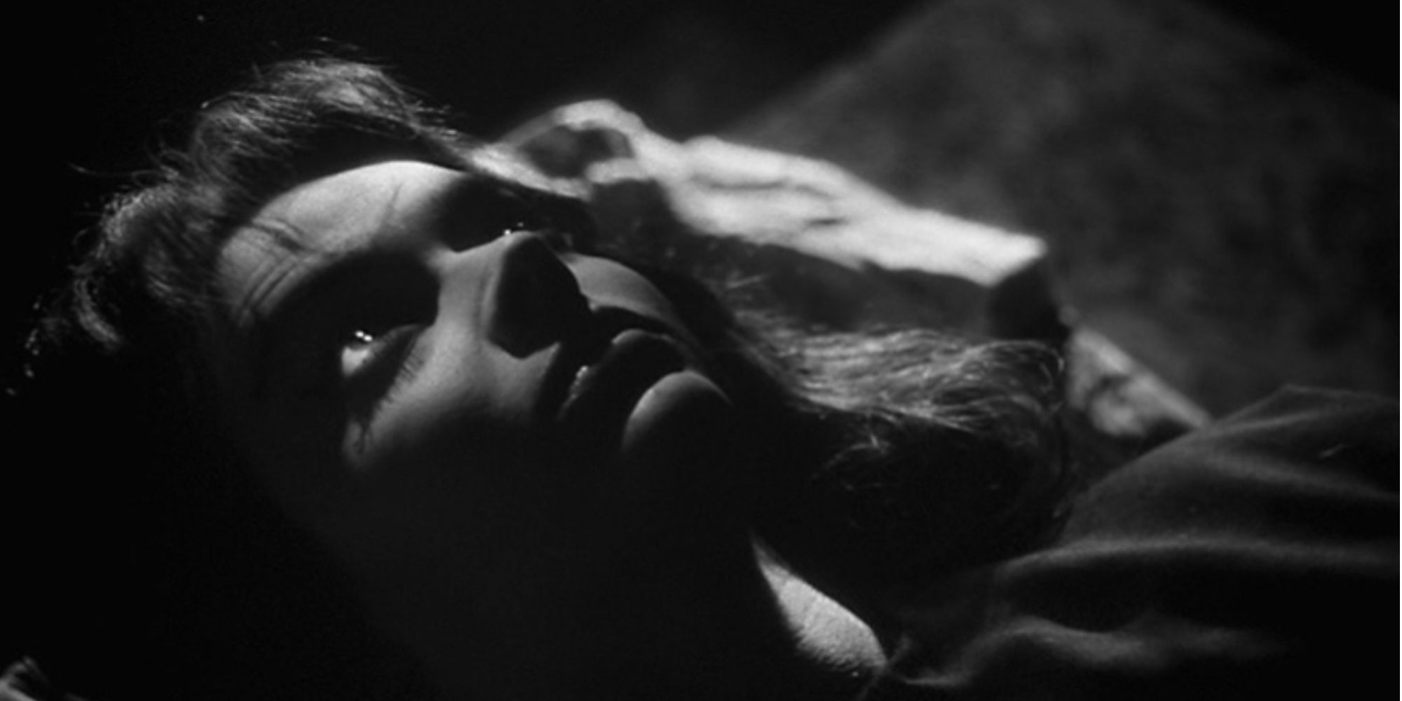 Barbara Steele as Asa Vadja, a young woman with eyes open laying down in 'Black Sunday'