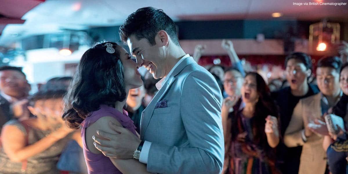 Constance Wu and Henry Golding as Rachel and Nick about to kiss in Crazy Rich Asians