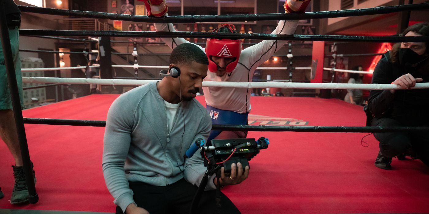 Michael B. Jordan directing Jose Benavidez on set Creed III