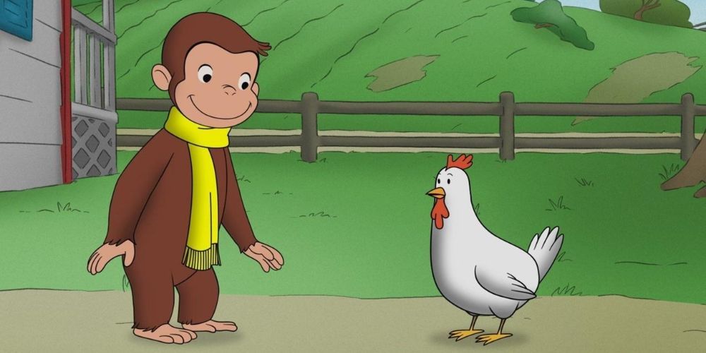 Curious George looking at a chicken