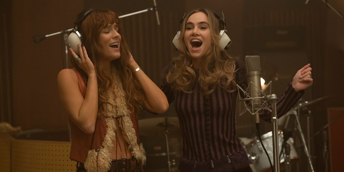 Suki Waterhouse and Riley Keough in Daisy Jones and The Six in Episode 6 singing in a recording booth