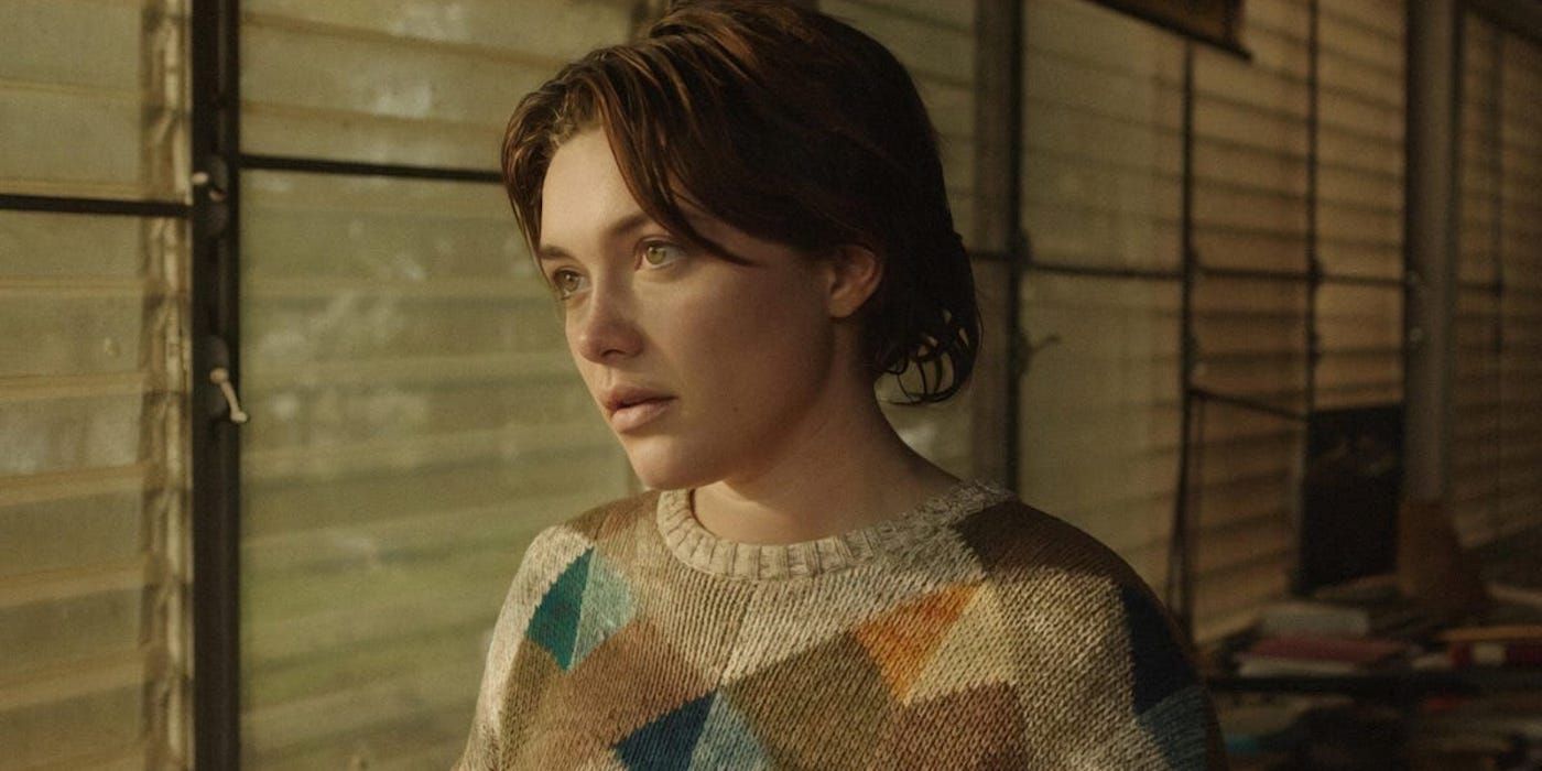 Florence Pugh as Allison Johnson looking intently at something off-camera in A Good Person