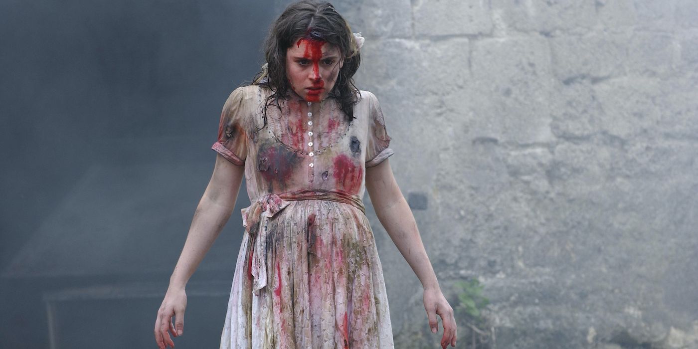 Girl wearing white dress covered in blood in Frontiers