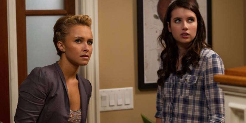 Kirby and Jill looking up at something off-camera in Scream 4