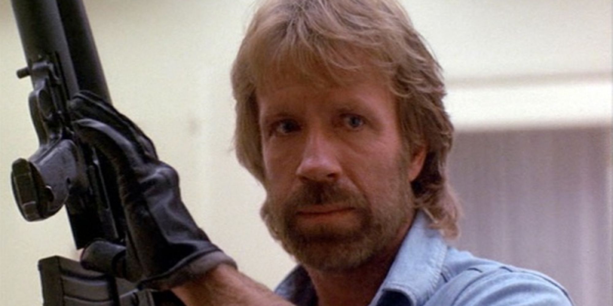 Chuck Norris readies his weapon