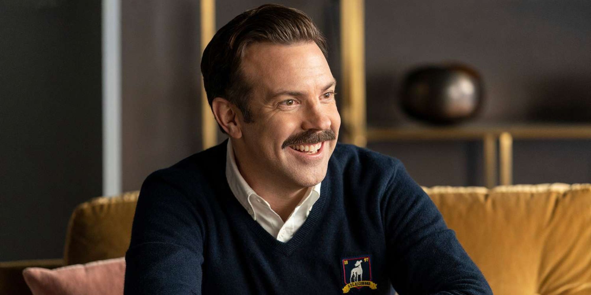 Jason Sudeikis smiling in Ted Lasso