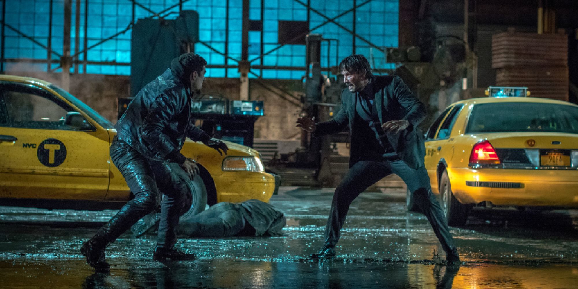 John Wick fights another man in John Wick Chapter 2.