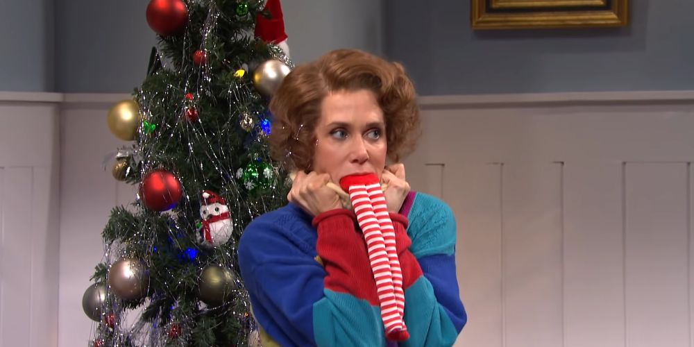 Une capture d'écran de Kristen Wiig dans le rôle de Sue the Surprise Lady dans Saturday Night Live