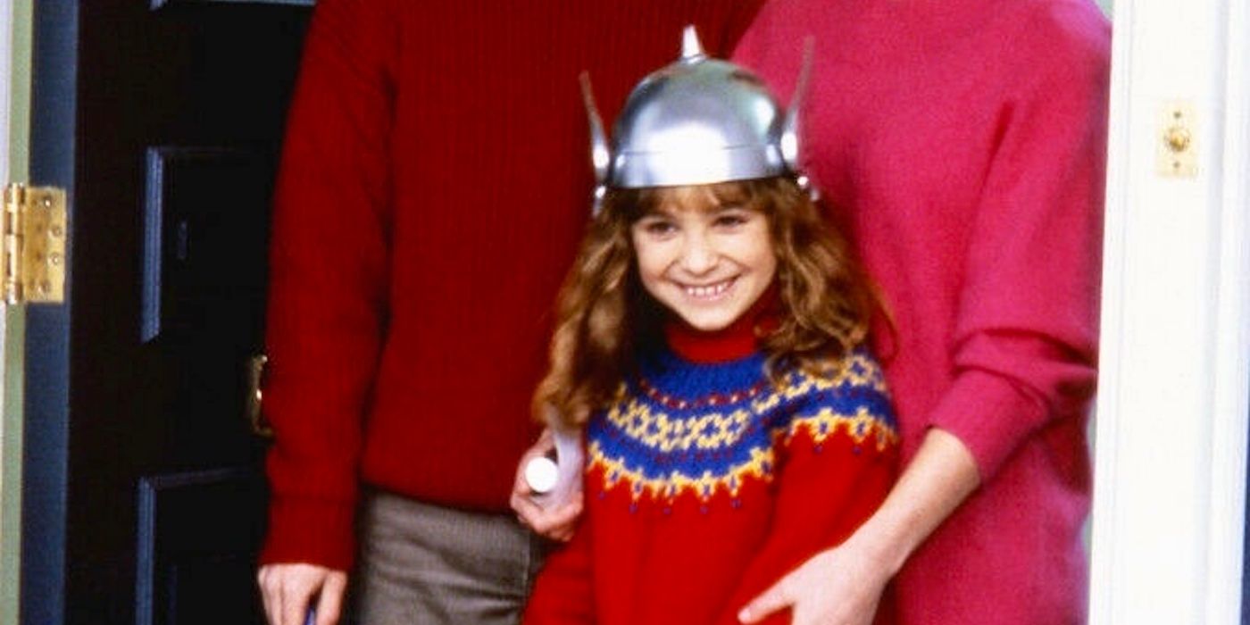 Maia Brewton wearing a thor hat in Adventures in Babysitting