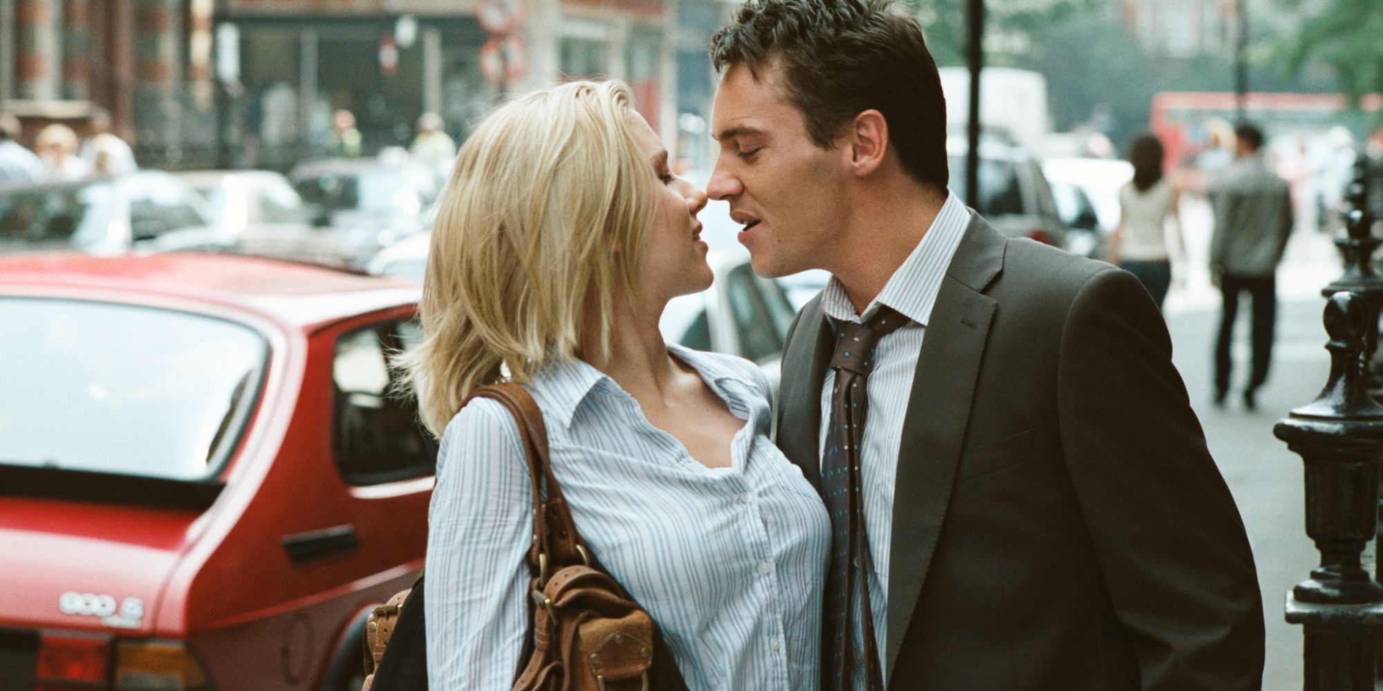 Scarlett Johansson and Jonathan Rhys Meyers as Nola and Chris about to kiss in Match Point