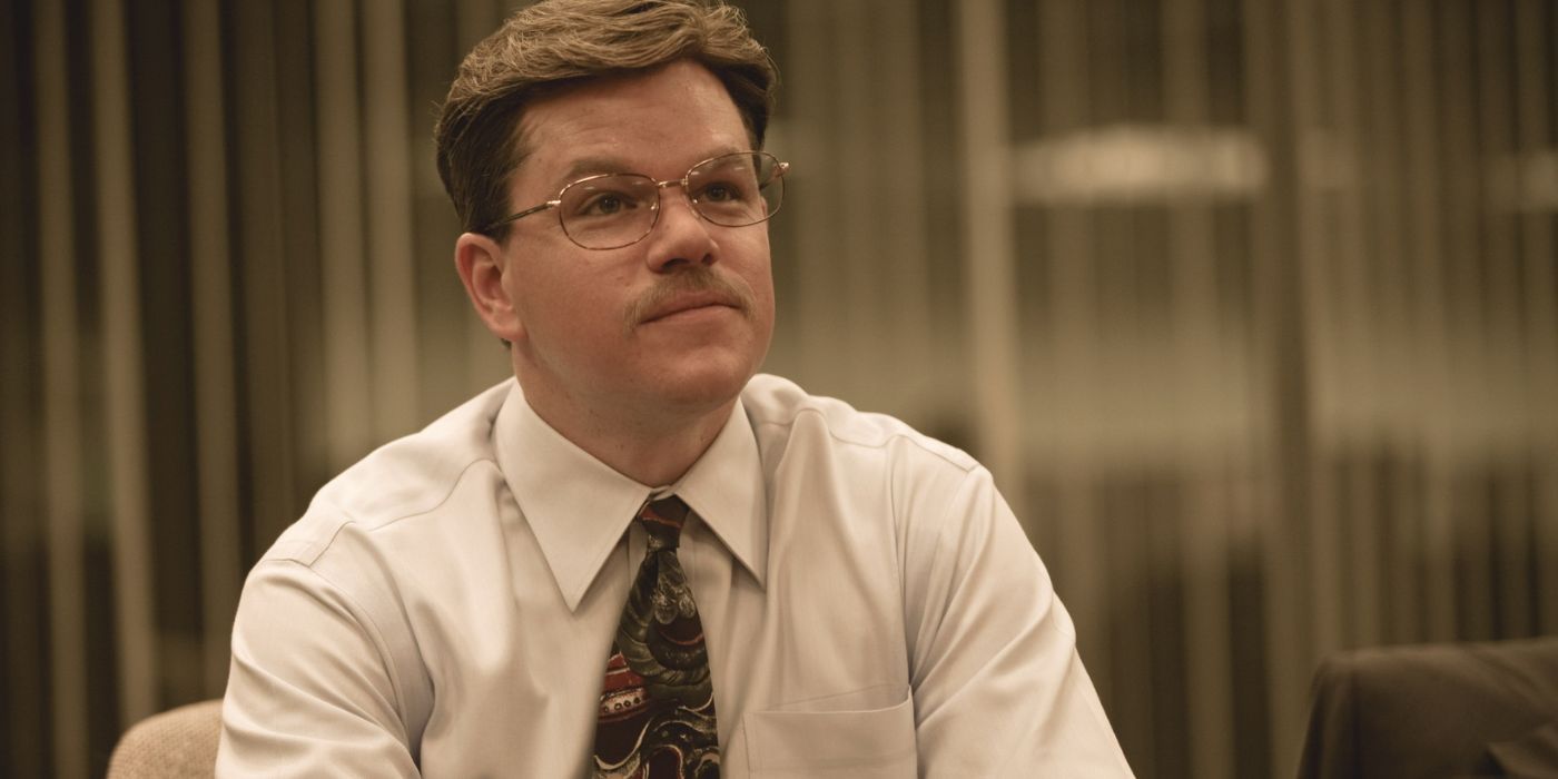 Matt Damon looking up at something in The Informant!