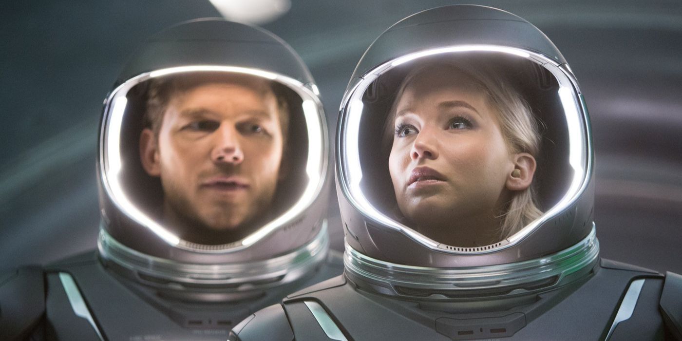 Jennifer Lawrence as Aurora and Chris Pratt as Jim wearing space suits in Passengers movie
