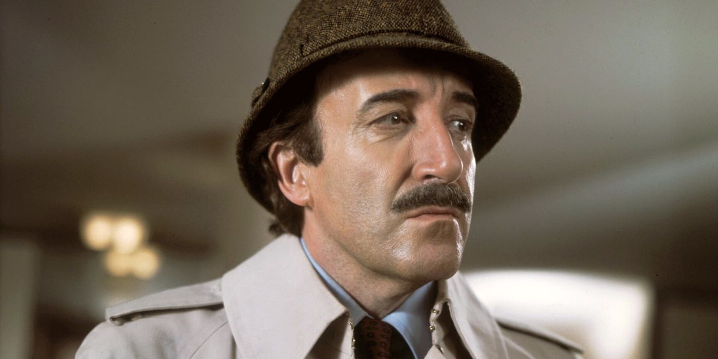 Inspector Clouseau looking to his left with an inquisitive look in The Pink Panther