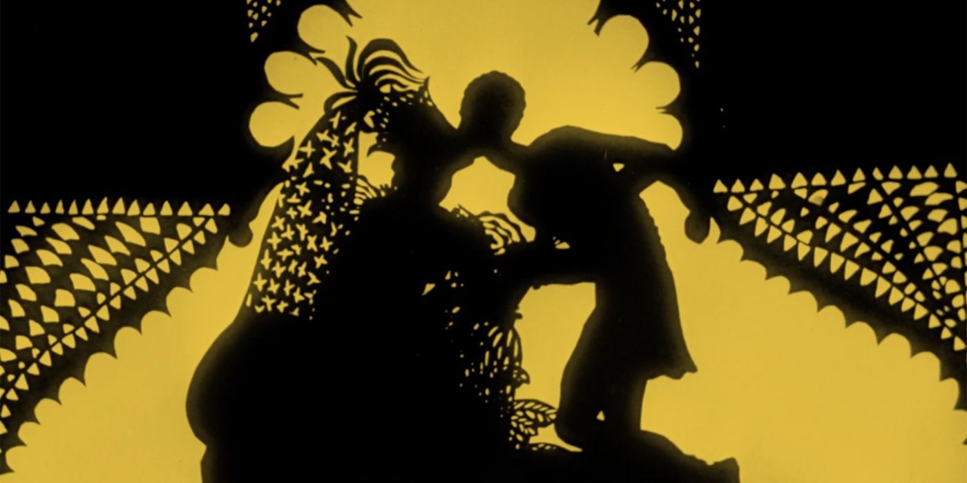 The silhouettes of a man and a woman kissing in 1926&rsquo;s The Adventures of Prince Achmed