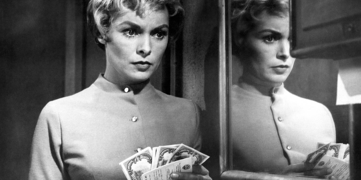 Janet Leigh as Marion Crane holding money in Psycho (1960)
