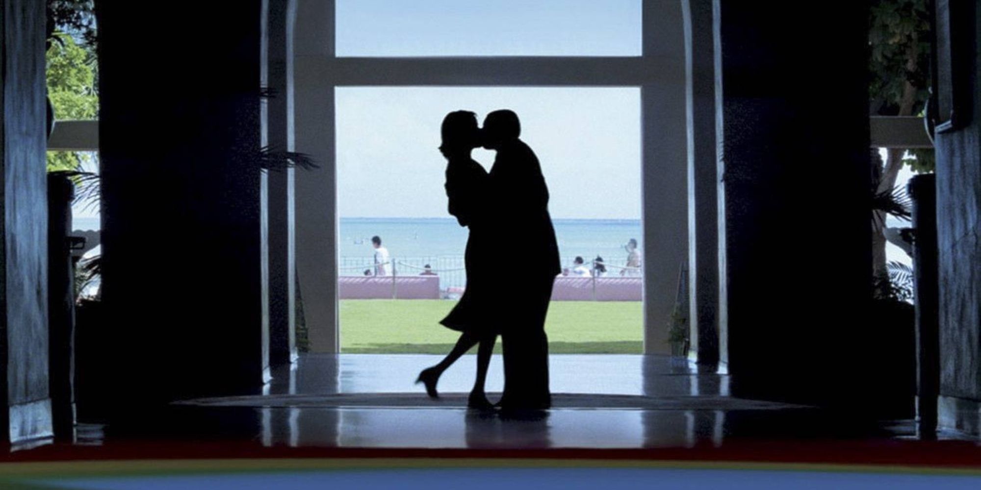 Silhouettes of Barry and Lena in front of a doorway in 'Punch-Drunk Love'