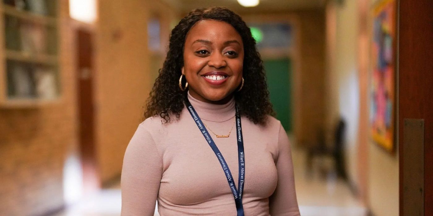 Quinta Brunson as Janine smiling for the camera in Abbott Elementary