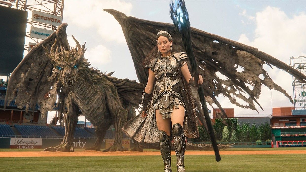 Lucy Liu as Kalypso with a dragon in Shazam!: Fury of the Gods. 