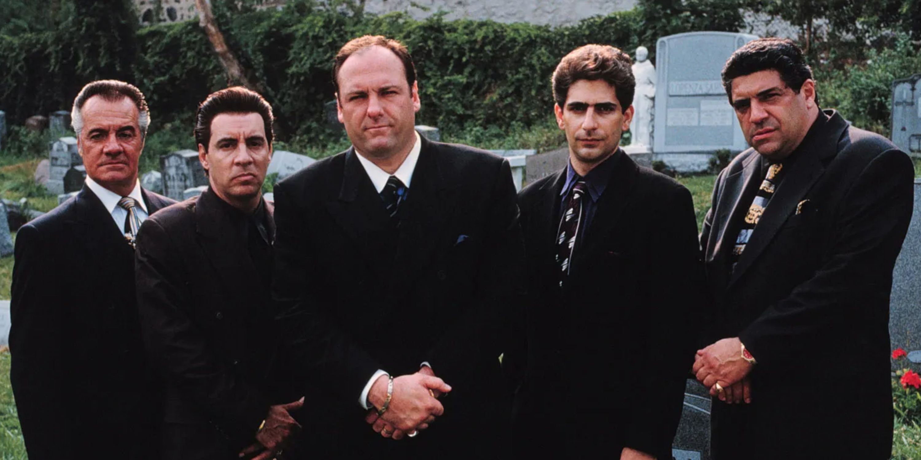 The leading men of the Sopranos in suits at a funeral