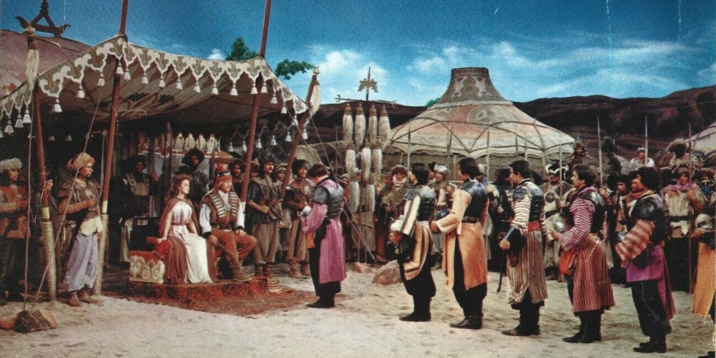 People lining up to see Bortai (Susan Hayward) and Genghis Khan (John Wayne) in The Conqueror