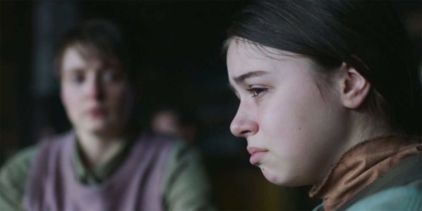 Girl crying over the death of her father in The Last of Us