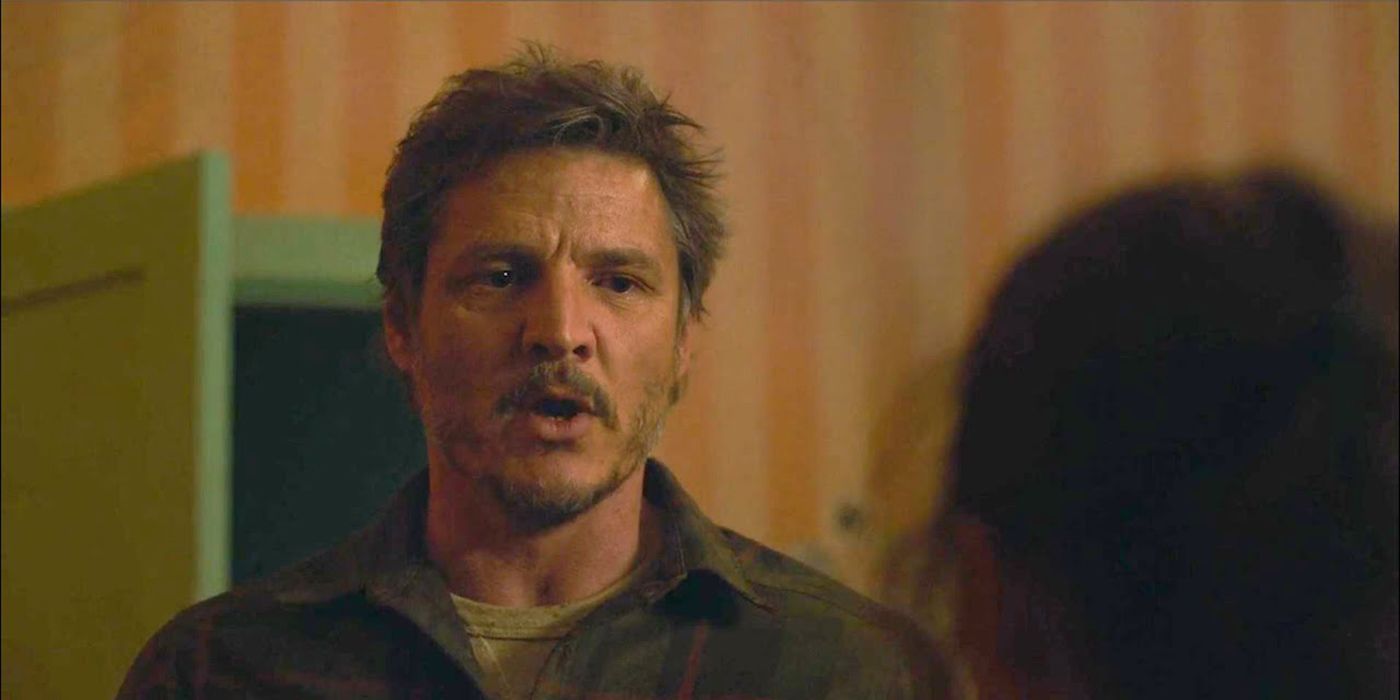 Joel, mulut terbuka berbicara dengan Ellie dalam sebuah adegan dari The Last Of Us.