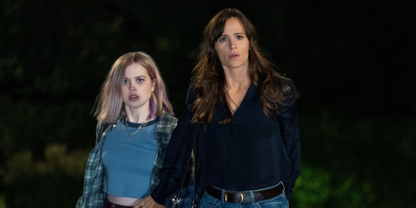 Jennifer Garner and Angourie Rice walking in the dark as Hannah and Bailey in The Last Thing He Told Me
