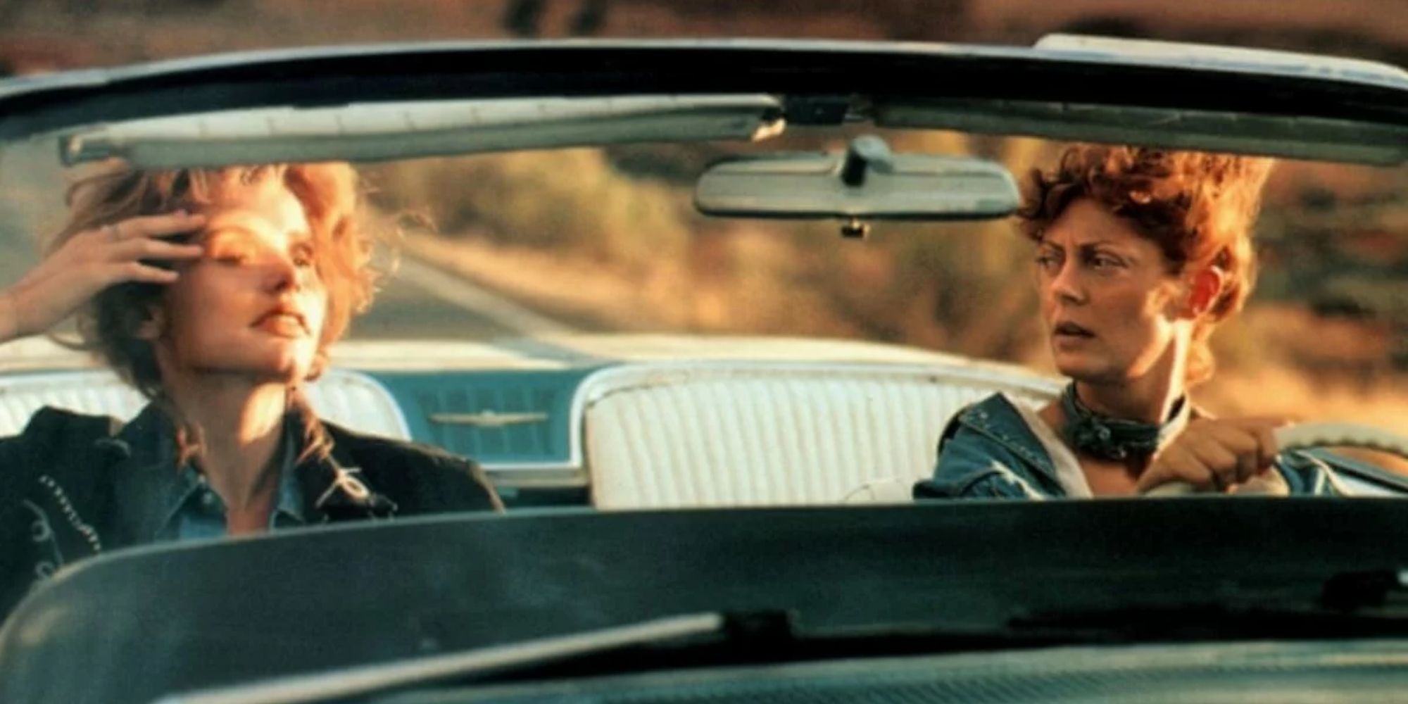 Thelma and Louise driving in a car in Thelma & Louise