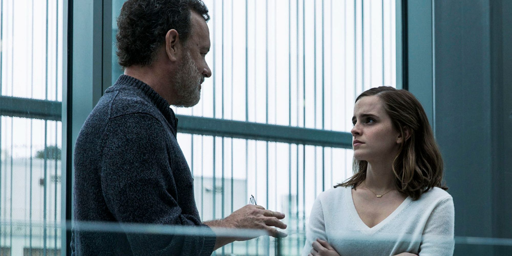 Tom Hanks and Emma Watson standing together in The Circle